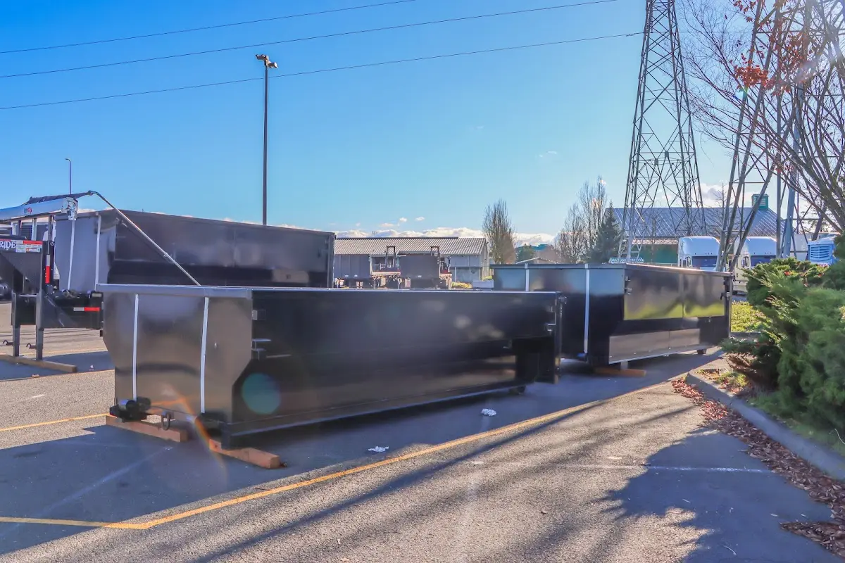 Roll-off dumpster ready for waste disposal at job site for 15 Yard Dumpster Rental in Robstown